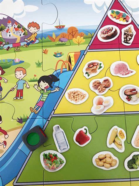Niños jugando juego educativo alimentación saludable