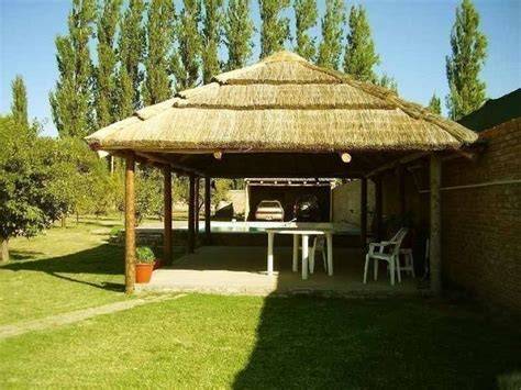 Quincho con paja chasquilla y campana